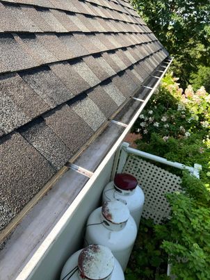 After unclogging: Brossard gutter cleared and operating normally