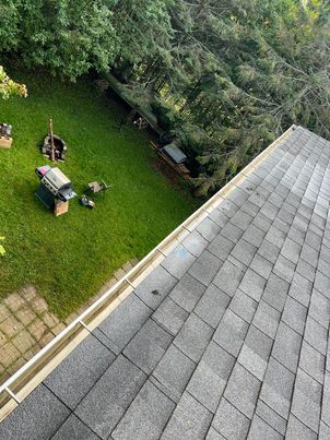 After preventive service: Candiac gutter rinsed clean with smooth drainage